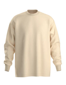 Plain oversized beige long sleeve crewneck t-shirt with ribbed cuffs and relaxed fit, displayed on a white background.